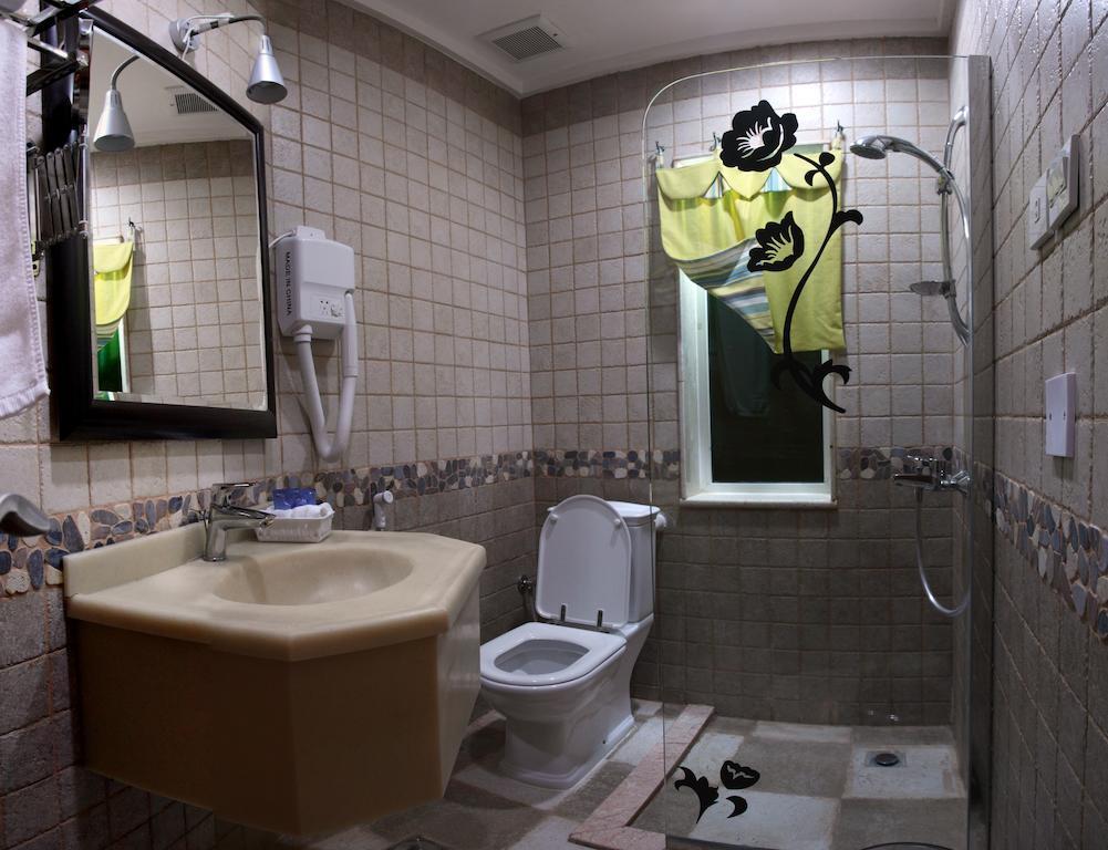 Lavande Suites Iambo Quarto foto