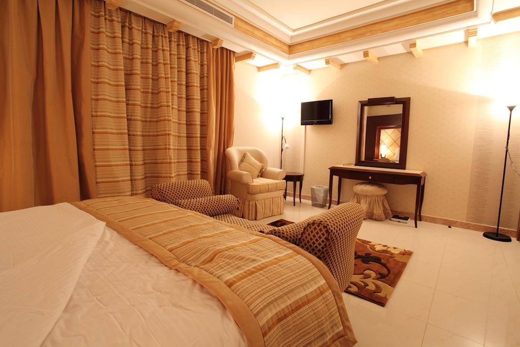 Lavande Suites Iambo Quarto foto