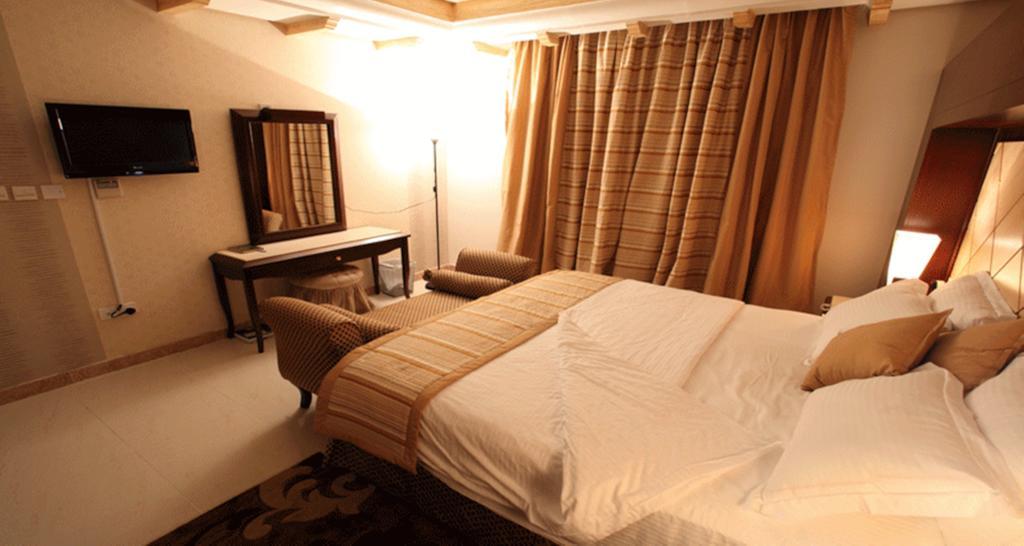 Lavande Suites Iambo Quarto foto